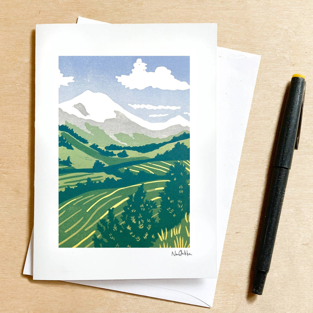 Home in the Mountains Greeting Card - Merry PigletsNan Onkka Prints